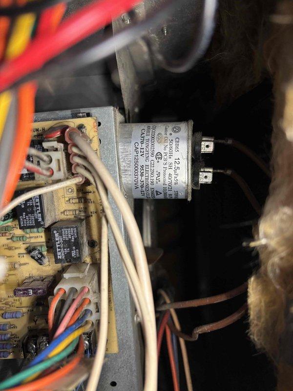 # AC Super Tune-Up Completed

Performed comprehensive AC Super Tune-up on residential cooling system. Conducted thorough inspection of all major components including evaporator coil, blower assembly, electrical connections, and capacitor. Verified proper operation of control board with multiple relays and confirmed all wire connections are secure with good insulation integrity. Noted significant rust and corrosion present on equipment base platform, though structural integrity remains intact and does not currently affect system operation. Cleaned accessible components, tested capacitor readings within acceptable range, and confirmed proper refrigerant line connections secured with appropriate fasteners. System operating normally upon completion with all safety checks passed.