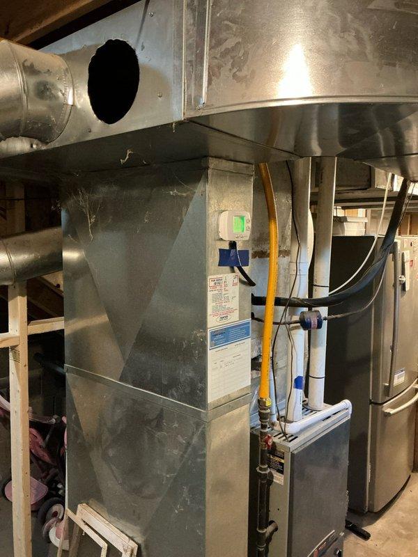 Performed estimate for replacement of 16-year-old Payne furnace and air conditioning system. AC unit experiencing refrigerant leak causing system to freeze, with history of previous low refrigerant issues. Inspected indoor furnace unit showing age-related wear and outdoor condenser unit with fan guard. Provided comprehensive replacement quotes for both heating and cooling equipment due to age of existing systems and ongoing refrigerant loss in AC unit.