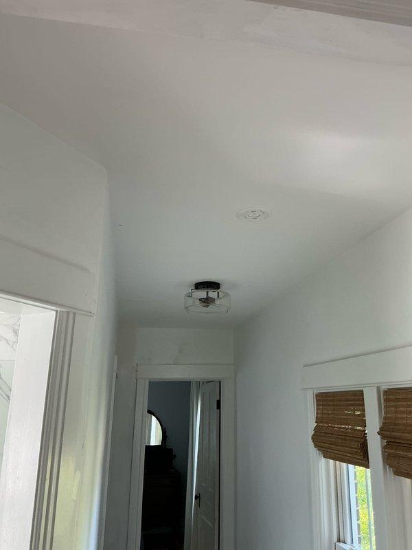 Conducted on-site evaluation for whole-home mini split system installation. Assessed interior spaces including hallway, bedroom areas, and existing ceiling-mounted fixtures to determine optimal placement for indoor air handling units. Documented room layouts, ceiling conditions, existing ventilation components, and structural considerations necessary for multi-zone ductless HVAC system design and equipment sizing.