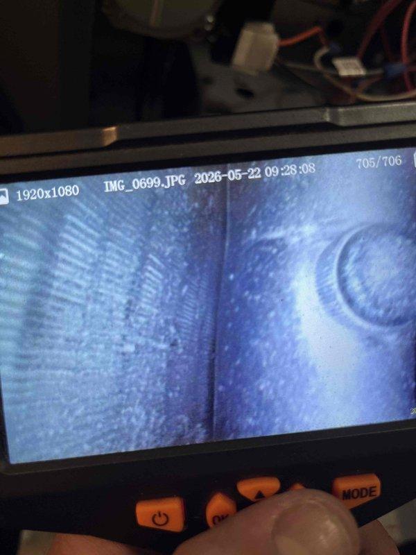 Completed annual cooling system maintenance and inspection on 8-year-old EnergiAir unit with warranty coverage through September 2027. Performed comprehensive AC tune-up including visual inspection of evaporator coil using borescope camera to assess fin condition and verify proper heat exchanger integrity. All components inspected and system operating within manufacturer specifications.