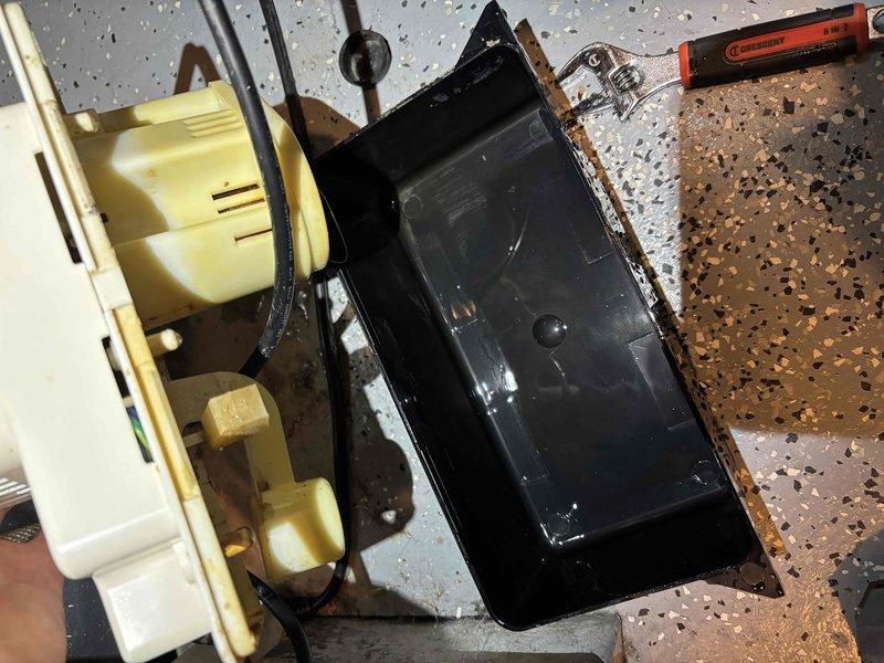 Completed annual cooling tune-up on 11-year-old EnergiAir system with 2020 condenser model. Upon inspection, discovered significant corrosion and rust on burner assembly and housing components, with standing water and sediment accumulation in collection pan indicating potential drainage issues. Disassembled unit to assess extent of corrosion damage, documented conditions with photos, and provided recommendations for component replacement due to advanced deterioration that could affect system reliability and efficiency.