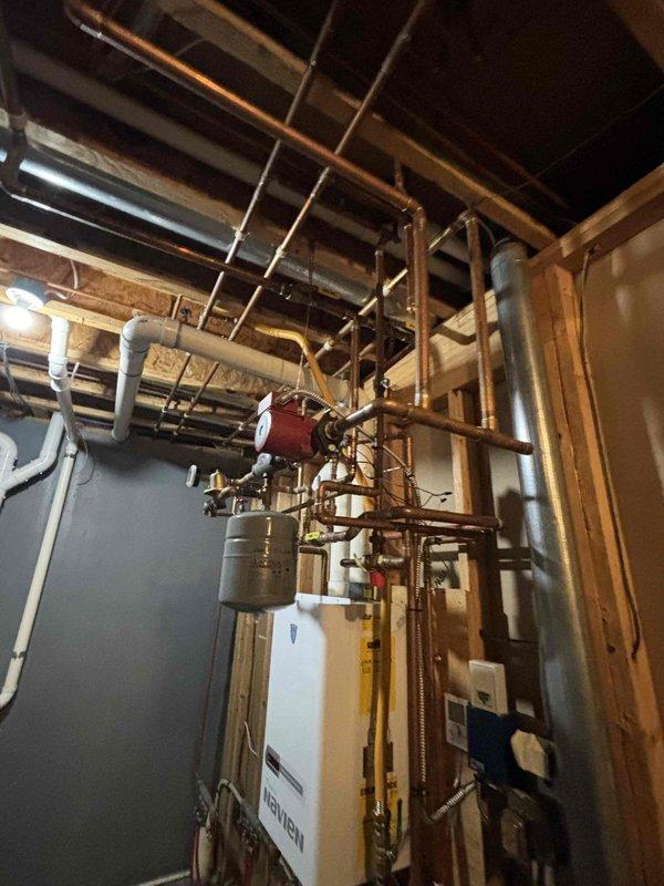 Responded to no heat call with dead thermostat display. Confirmed thermostat had no power after initial low battery indication. Replaced thermostat batteries, restored power to unit, and verified HVAC system operation. System returned to normal heating function with proper thermostat communication.