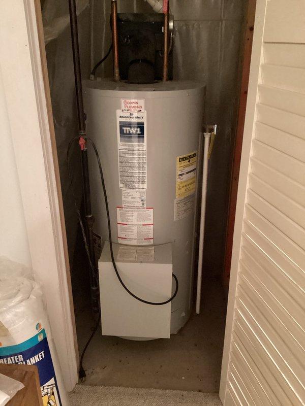Completed estimate for water heater replacement on 32-year-old unit installed in utility closet. Documented existing TTW-1 model water heater with standard copper piping connections and assessed plumbing infrastructure including exposed basement piping systems. Customer also requested thermostat evaluation for potential service if time permitted.