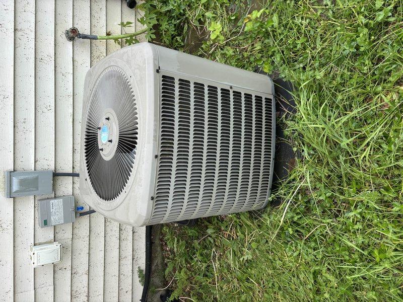 Completed annual cooling maintenance on 10-year-old Goodman air conditioning system. Performed comprehensive tune-up including inspection of outdoor condenser unit, verified proper operation of compressor and fan motor, checked refrigerant levels and pressures, cleaned condenser coils, and inspected electrical connections at disconnect box. Unit operating within manufacturer specifications upon completion of service.