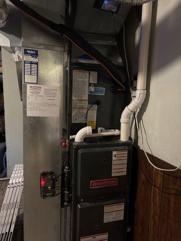 Completed full HVAC system replacement including outdoor condensing unit and indoor air handler. Installed new Goodman equipment on existing concrete pad in backyard with proper clearances maintained from landscaping and deck structure. Connected refrigerant lines, electrical service, and condensate drainage to new units, ensuring all connections meet manufacturer specifications and local code requirements.