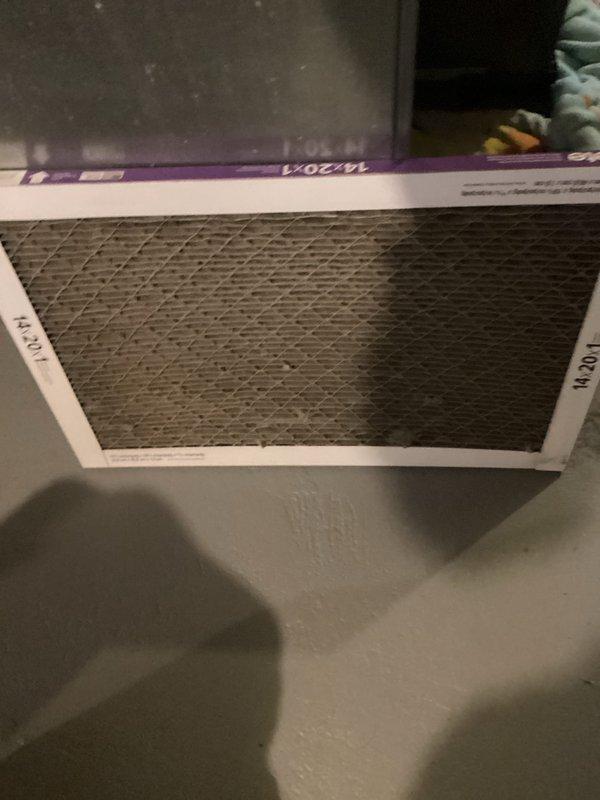 Responded to water leak complaint occurring only during AC operation on 20-year-old Goodman system model CAPF3030B6AA. Upon inspection, identified condensate drainage issue causing water to puddle beneath furnace. Verified evaporator coil drain line and condensate system functionality. Inspected air filter condition, which appeared clean with proper airflow. Documented equipment nameplate information confirming R22/R410A compatible unit manufactured by Goodman Manufacturing Corp. System evaluated and condensate management addressed to resolve leaking condition during cooling mode operation.