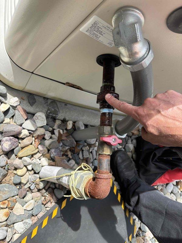 Responded to emergency call after utility company issued pink tag for significant gas leak at generator union connection. Inspected 2-year-old Generac unit and identified leaking union fitting on gas supply line. Tightened connection, applied pipe dope to threads, and pressure tested system to verify leak was eliminated and all connections were secure per manufacturer specifications.