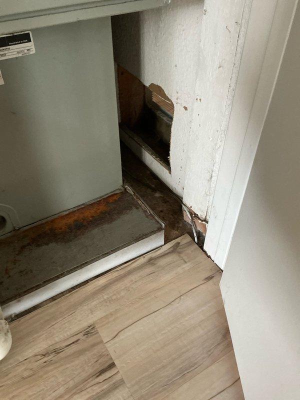 Completed estimate for replacement of 28-year-old furnace and 25-year-old air conditioning system. Existing furnace experiencing gradual failure and outdoor AC condenser unit non-operational. Documented existing equipment including exterior condenser unit positioned on concrete pad with electrical disconnect, and interior furnace showing signs of deterioration with visible structural damage and water staining at installation location.