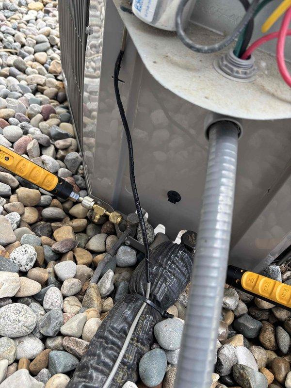 Completed annual cooling maintenance on 1-year-old Bryant air conditioning system. Performed comprehensive tune-up including inspection of outdoor condenser unit, electrical components, capacitor, contactors, and wiring connections. All system components found operating within normal parameters, pressures checked and verified proper refrigerant charge. Unit serviced and ready for cooling season.