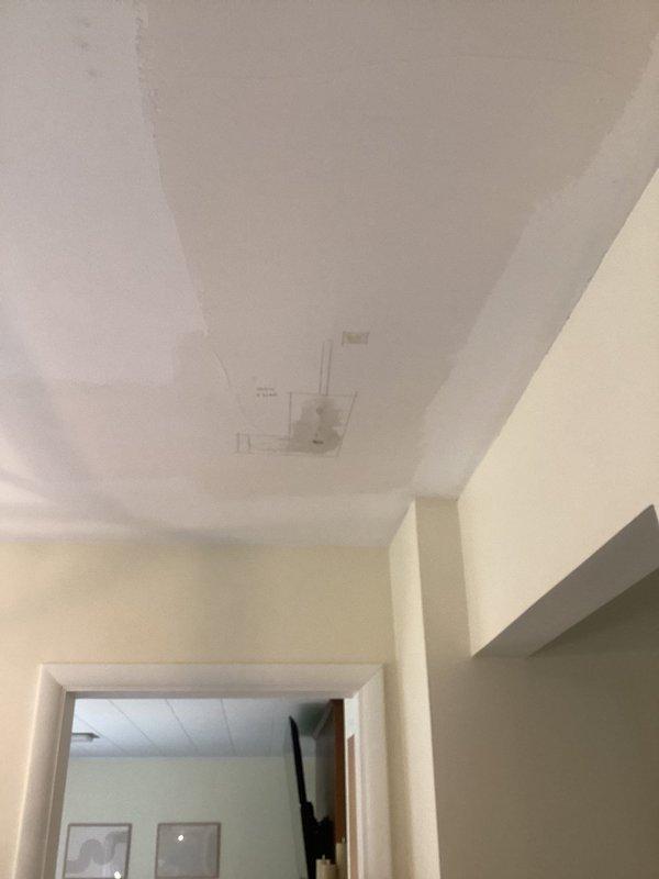 Responded to plumbing leak concern in residential bathroom. Upon inspection, accessed ceiling cavity through attic hatch to investigate potential water intrusion above bathroom area. Examined plumbing fixtures, supply lines, and drain connections for signs of active leaking or moisture damage. Inspected toilet installation, wax ring seal, and water supply connection for proper operation. Verified all visible plumbing components in bathroom were functioning correctly with no active leaks detected at time of service call.