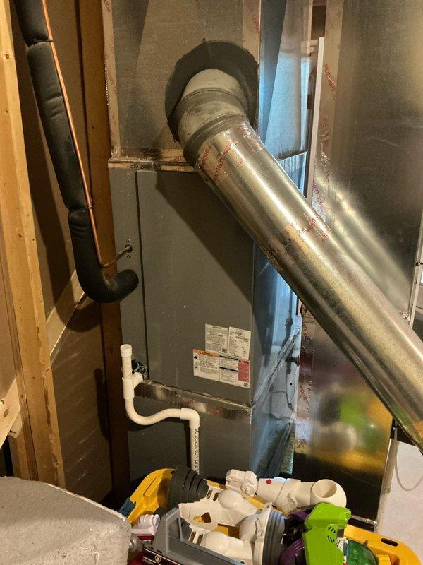 Performed comprehensive diagnostic evaluation on 9-year-old residential air conditioning system experiencing inadequate cooling for approximately one week with rising indoor temperatures. Previous service provider had identified frozen evaporator coil condition but declined to complete repairs citing ambient temperature concerns. Conducted thorough system inspection of both indoor air handler unit and outdoor condensing unit, documented equipment condition and installation configuration with photographic evidence. Assessed refrigerant circuit operation, airflow performance, electrical components, and drainage system functionality to identify root cause of cooling failure and provide accurate estimate for necessary repairs to restore proper system operation.