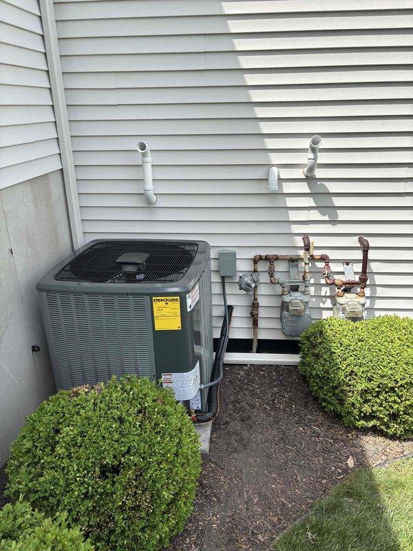 Completed full HVAC system installation including new furnace and air conditioning unit. Installed outdoor condensing unit on concrete pad with proper refrigerant line connections, electrical disconnect box, and PVC condensate drainage piping. Indoor installation included new furnace unit with associated ductwork connections, PVC venting system, and all required electrical and gas connections in mechanical room. All equipment properly mounted, leveled, and secured per manufacturer specifications. System tested and verified operational.
