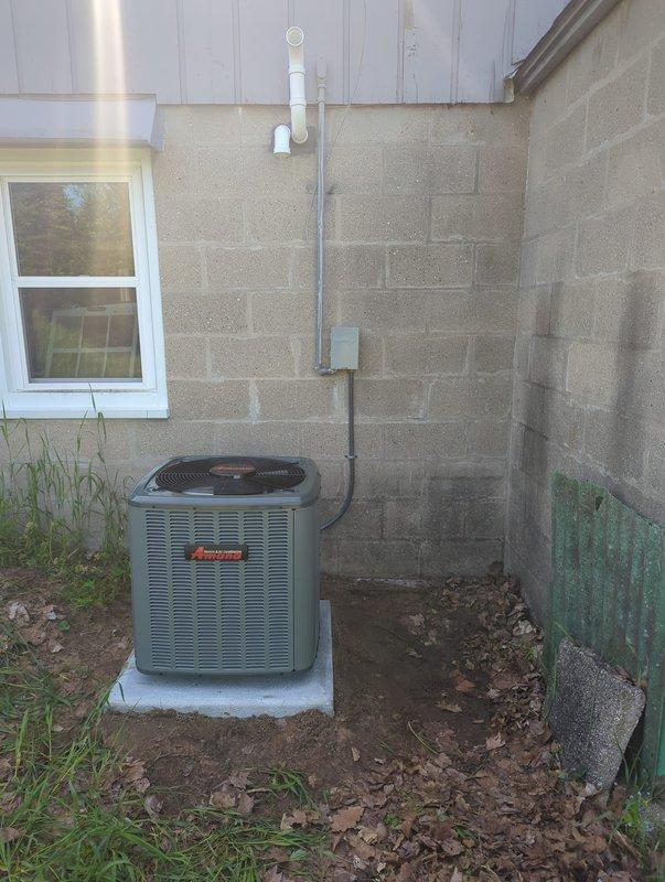 Completed full ACREP-AC system replacement including indoor and outdoor components. Installed new Amana condensing unit on existing concrete pad with proper electrical disconnect and refrigerant line connections. Mounted new furnace/air handler in basement mechanical room with appropriate venting using white PVC piping secured with proper fasteners. Ran electrical conduit and established all necessary connections between indoor and outdoor units. Verified proper refrigerant charge, tested system operation through complete cooling cycle, and confirmed all safety controls functioning correctly. System commissioned and left operational.