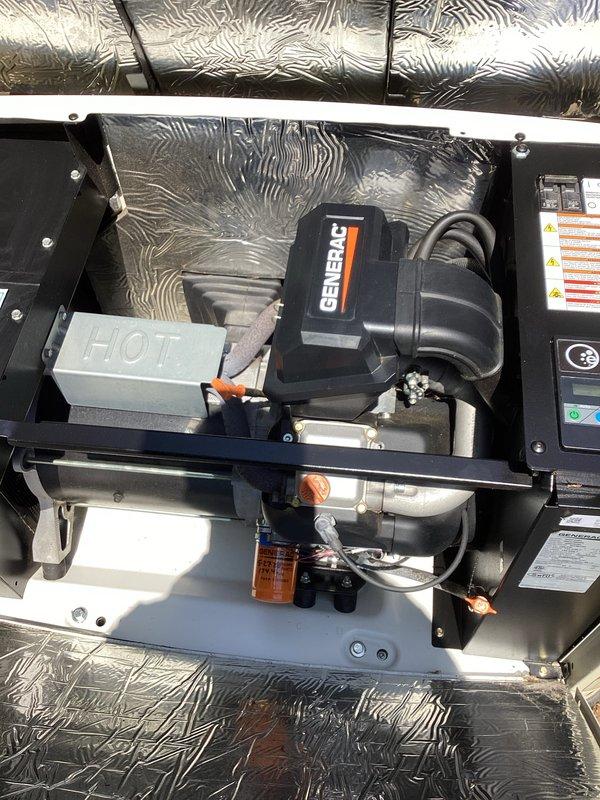 Completed annual recurring maintenance service on 7-year-old Generac generator unit. Performed comprehensive tune-up including inspection of internal engine components, fuel system, oil filter, electrical connections, and wiring harnesses. All mechanical components, fuel filter assembly with copper fittings, and safety warning systems verified operational. Generator tested and confirmed in proper working condition for continued reliable standby power operation.