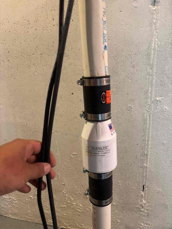Completed sump pump and check valve replacement as quoted. Installed new PVC discharge piping with proper coupling connections and integrated a high-performance water hammer arrestor (silencer) into the vertical discharge line to eliminate banging noise in the plumbing system. All connections secured with stainless steel hose clamps and tested for proper operation.