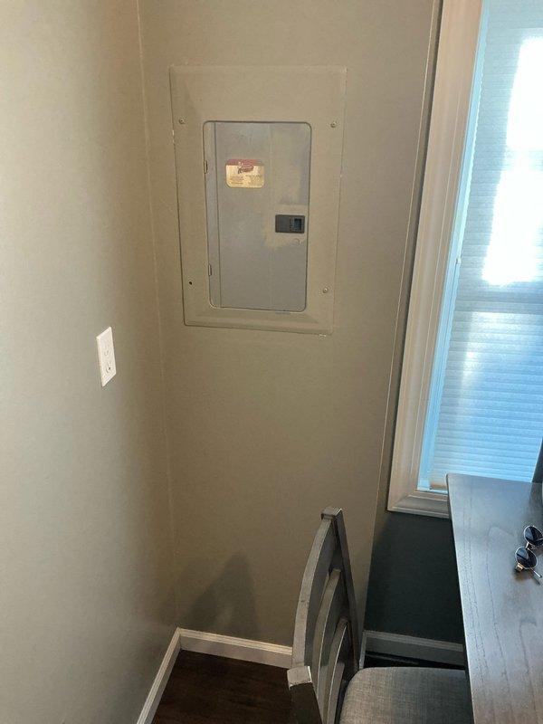 Completed sales estimate for central air conditioning installation in a standard residential home with no existing central AC system. Documented existing electrical panel infrastructure and assessed installation requirements, confirming adequate electrical capacity and suitable location for new HVAC equipment. Verified customer contact information and captured photographic documentation of electrical panel and proposed equipment placement area.