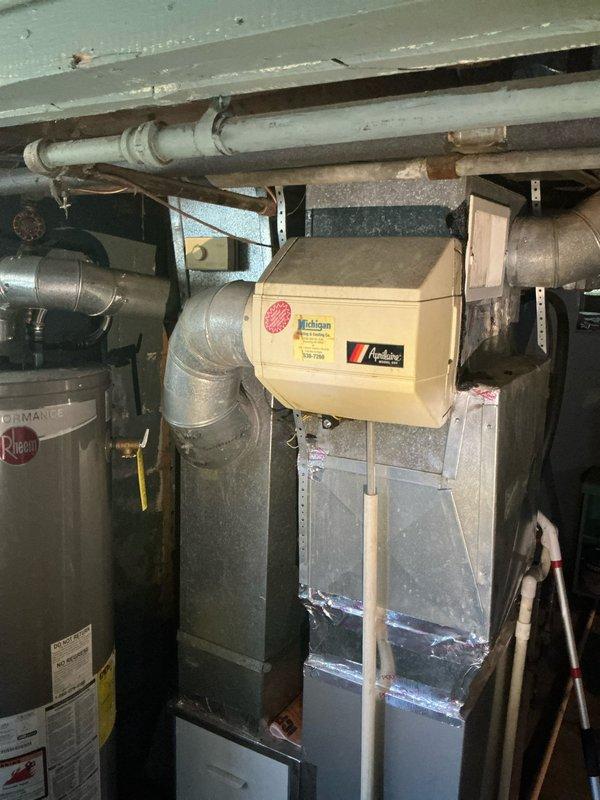 Completed comprehensive assessment of non-operational residential air conditioning system in basement utility area. Evaluated existing HVAC infrastructure including furnace unit, ductwork configuration, and air handler components to determine full system replacement requirements. Documented current equipment layout, electrical connections, refrigerant line routing, and condensate drainage pathways. Assessed structural considerations for new equipment installation including clearance requirements, ventilation access, and integration with existing duct system. Provided detailed estimate for complete AC system replacement to restore cooling functionality to home.