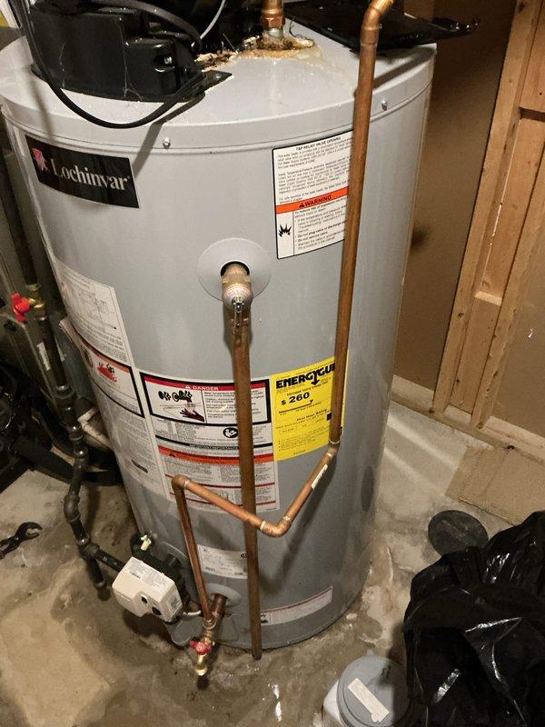 Responded to service call for inadequate cooling on upper floor of three-story residence with approximately 8-year-old HVAC system. Performed diagnostic evaluation of air conditioning unit and inspected accessible ductwork and mechanical systems in basement utility area. Documented equipment conditions and system components including water heater, pressure tank, electrical conduits, and PEX plumbing lines during inspection. Unable to identify definitive cause of cooling deficiency from visual inspection of accessible areas; recommended further diagnostic testing of refrigerant levels, airflow measurements, and zoning system functionality to isolate root cause of insufficient cooling performance on upper level.
