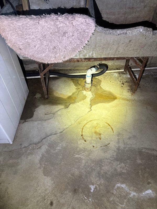 Responded to sump pump concern where pump was continuously running and basin would not empty properly. Upon inspection, found evidence of significant water intrusion and moisture damage in basement utility area. Diagnosed malfunctioning float switch preventing pump from cycling off correctly. Adjusted float mechanism and tested pump operation to verify proper automatic shutoff functionality restored.