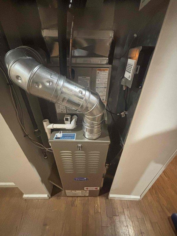 Completed full HVAC system installation including new furnace and air conditioning condenser unit. Installed furnace in interior mechanical closet with proper ductwork connections and venting assembly extending into ceiling space. Mounted outdoor AC condenser unit on concrete pad against exterior wall with appropriate refrigerant line connections, electrical conduit, and secure mounting hardware. All components tested and operational upon completion.