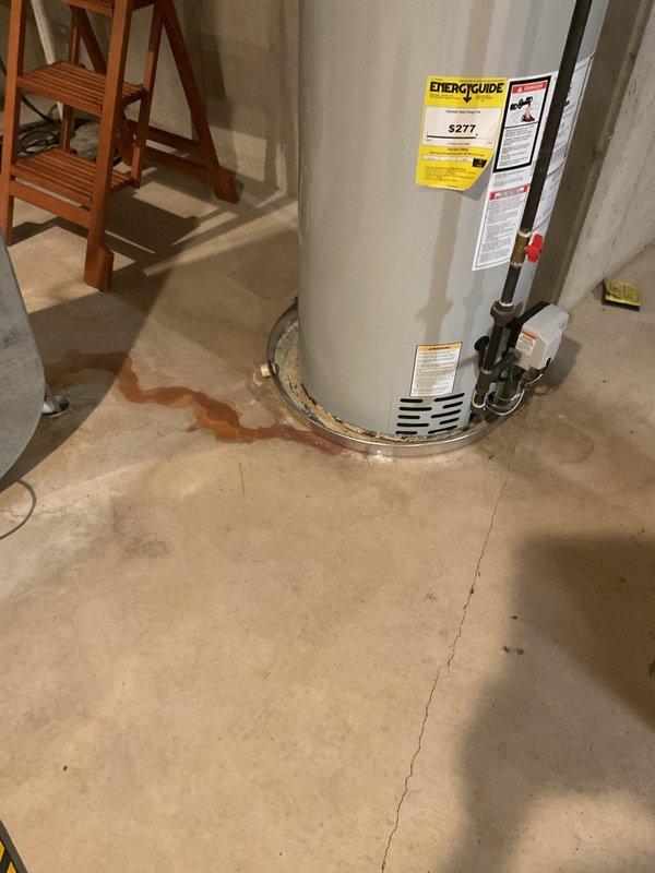 Responded to service call for Trane air handler displaying compressor filter error code and producing warm air from vents. Upon arrival, inspected 19-year-old Trane HVAC system located in basement utility area. Verified system status via digital control panel showing active fault code. Examined air handler unit, refrigerant line connections, and associated components for proper operation. Documented equipment condition and installation with photographic evidence showing copper refrigerant lines with insulation, wall-mounted electrical components, and overall system configuration. System evaluated for airflow restrictions, filter status, and compressor functionality to diagnose warm air issue and resolve error code condition.