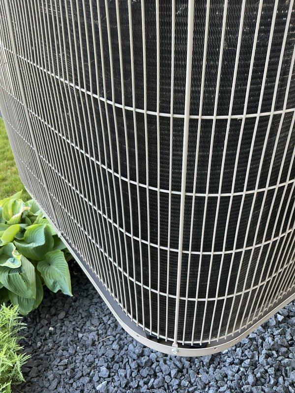 Completed annual cooling maintenance on 3-year-old Bryant air conditioning system with 2023 condenser model. Performed comprehensive tune-up including inspection of outdoor condenser unit, electrical disconnect components, and all accessible system connections. Unit found in good operating condition with clean condenser coils, proper gravel base drainage, and secure electrical terminations. All components inspected and documented photographically for service records.