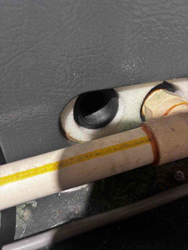 Completed annual cooling maintenance on 17-year-old air conditioning system. Performed comprehensive tune-up inspection of all major components, verified proper refrigerant levels, checked electrical connections, and confirmed system operational efficiency. Updated customer contact information and documented equipment condition with photos of condensate drain assembly and internal mechanical compartment showing all connections secure and functioning properly.