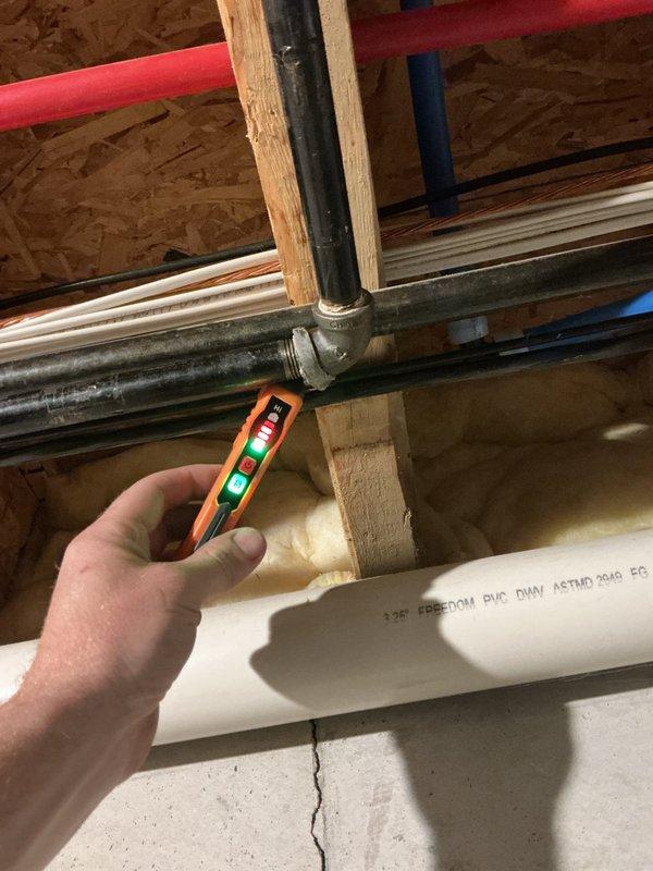 Responded to active gas leak on heating system furnace. Located leak at black iron gas piping connections in exposed ceiling/attic space near furnace installation. Used combustible gas detector to identify leak point at threaded pipe fitting. Tightened compromised connection and applied pipe joint compound to ensure proper seal. Performed pressure test and soap bubble test to verify leak repair. Confirmed no additional leaks detected on gas line system. Furnace remained operational throughout service. Inspected surrounding gas piping infrastructure including connections to ensure system integrity. All gas connections tested and verified leak-free upon completion.