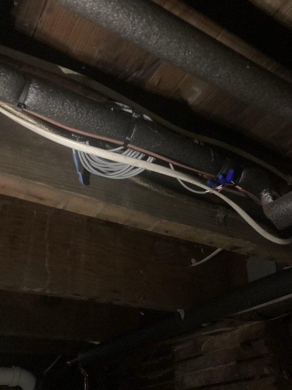 Replaced defective temperature sensor on heat pump system. Accessed sensor location in crawl space near ductwork and completed installation of new sensor component. System tested and verified operational upon completion.