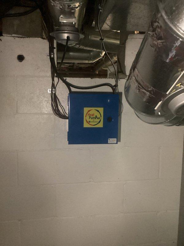 Replaced defective temperature sensor on heat pump system. Accessed sensor location in crawl space near ductwork and completed installation of new sensor component. System tested and verified operational upon completion.