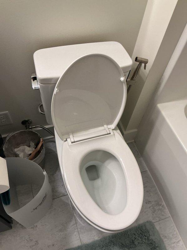 Responded to customer complaint of musty odor in bathroom following recent toilet reseating work. Performed inspection of toilet installation and surrounding area to identify source of odor. Verified proper seal at base of toilet, checked wax ring integrity, and examined drainage connections for potential sewer gas leaks that could cause musty smell.