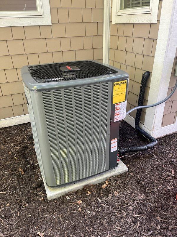 Completed full air conditioning system replacement at residential property. Installed new outdoor condensing unit on existing concrete pad with proper clearances from exterior wall, secured all refrigerant line connections, and verified electrical connections to outdoor unit. Interior installation included new air handler equipment integrated with existing Luxaire furnace system in basement mechanical room, with all refrigerant lines, condensate drainage, and PVC venting properly routed and secured. System was pressure tested for leaks, evacuated, charged to manufacturer specifications, and tested through complete cooling cycle to verify proper operation of all components.