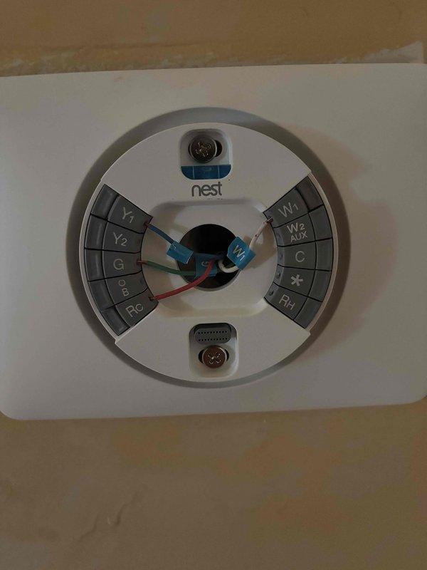 Responded to no cooling call on 9-year-old Maytag system with thermostat displaying "lacking Y1 feed" fault. Upon arrival, found both heating and cooling functions inoperative following recent heat exchanger replacement performed by another contractor. Inspected Nest thermostat wiring at wall base and traced connections to furnace control board. Identified missing or improperly terminated Y1 wire connection at control board that was disturbed during previous heat exchanger service. Verified all thermostat wiring terminals including RC, W1, G, C, and Y1 connections. Re-established proper Y1 circuit connection at furnace control board terminal strip, ensuring secure termination. Tested system operation through multiple heating and cooling cycles. Confirmed thermostat fault cleared, air conditioning engaging properly on Y1 call, and furnace responding correctly to heat demand. System restored to full functionality with both heating and cooling operating as designed.