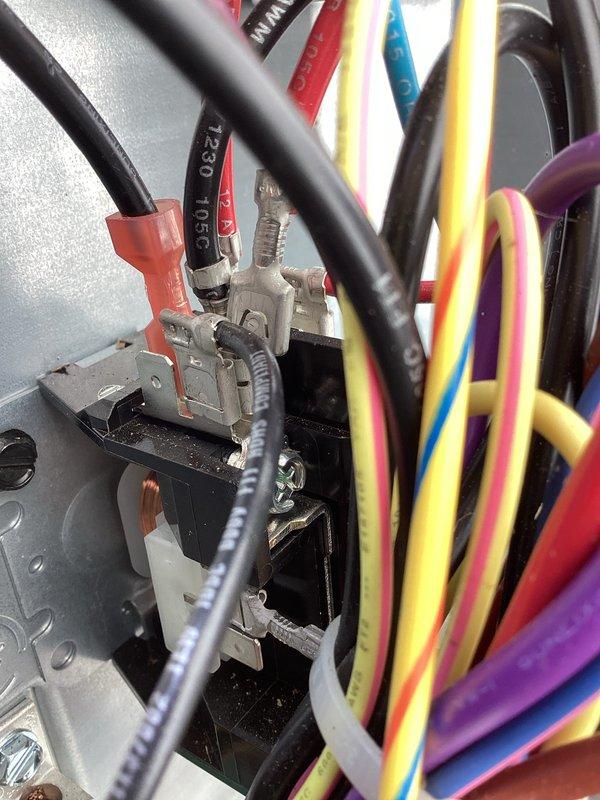 Completed annual cooling maintenance on EnergiAir system. Performed comprehensive inspection of electrical connections and control wiring within unit compartment. Verified proper termination of all circuit wiring including power, control, and communication lines at terminal blocks. Inspected wire routing and connections, ensuring secure fastening at all terminal points. Documented electrical component condition with detailed photographs of wiring compartment and terminal connections. All electrical connections found secure with no signs of overheating or deterioration. System operating within normal parameters upon completion of maintenance visit.