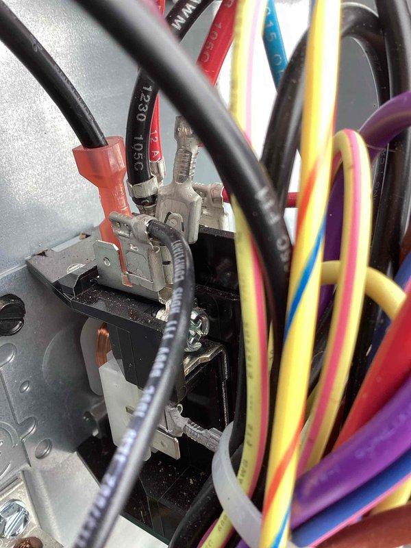 Completed annual cooling maintenance on EnergiAir system. Performed comprehensive inspection of electrical connections and control wiring within unit compartment. Verified proper termination of all circuit wiring including power, control, and communication lines at terminal blocks. Inspected wire routing and connections, ensuring secure fastening at all terminal points. Documented electrical component condition with detailed photographs of wiring compartment and terminal connections. All electrical connections found secure with no signs of overheating or deterioration. System operating within normal parameters upon completion of maintenance visit.