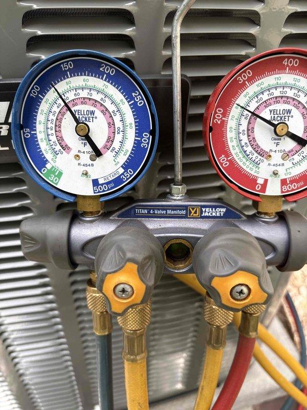 Completed full air conditioning system replacement at residential property. Removed existing AC unit and installed new AirEase condensing unit with proper refrigerant line connections. Utilized Yellow Jacket 4-valve manifold gauge set to verify proper refrigerant charge and system pressures during startup. Ensured all electrical connections, condensate drainage, and PVC venting were properly configured and operational. System tested and confirmed cooling operation within manufacturer specifications.