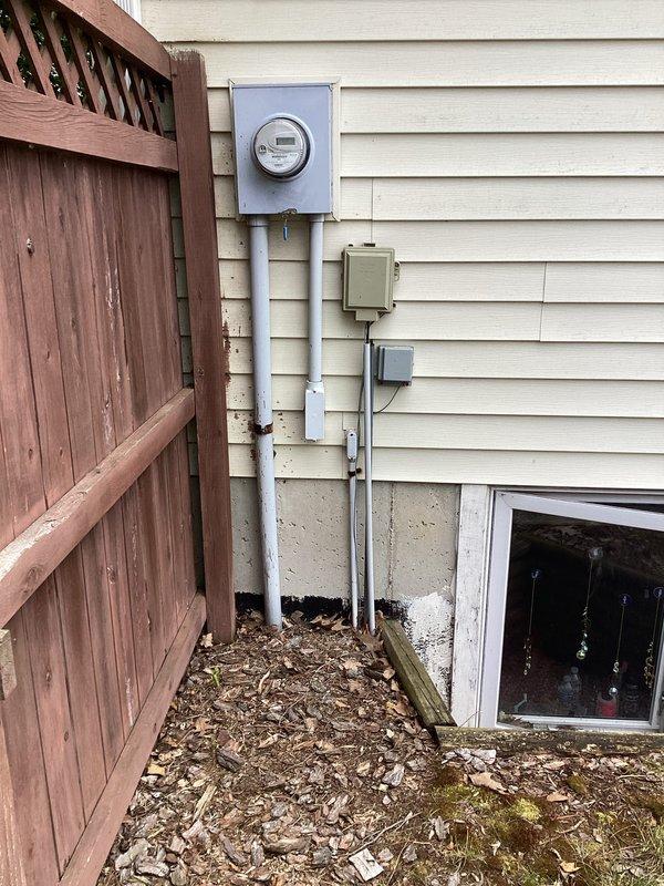 Completed comprehensive electrical safety inspection on 38-year-old residential property with no reported electrical issues. Performed exterior assessment of electrical service entrance, meter enclosure, and associated conduit routing; verified proper installation and condition of exterior junction boxes and weatherhead connections. Conducted interior evaluation of main electrical panel, documenting breaker configuration, labeling, and overall system integrity. All components found to be in acceptable working condition with no immediate safety concerns identified at time of inspection.