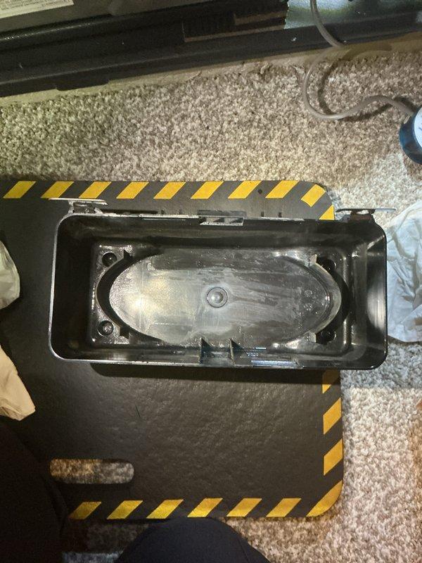 Completed annual cooling maintenance on 1-year-old Carrier system. Discovered standing water with sediment accumulation in condensate drain pan, indicating drainage issue. Cleared condensate line obstruction and verified proper drainage flow to prevent potential water damage and system shutdown.