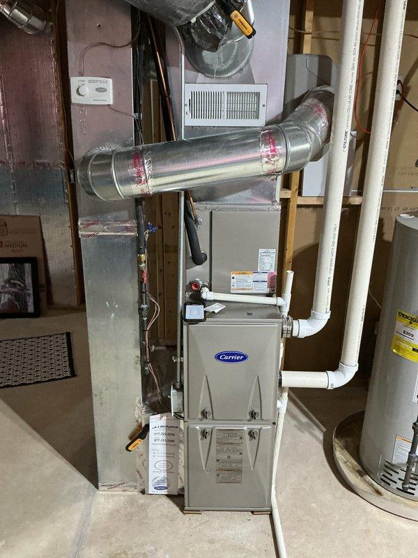 Responded to no-cooling call on 6-year-old Carrier system experiencing startup failure after thermostat delay cycle. Upon arrival, confirmed outdoor condenser unit attempted to start but immediately shut down with no error codes displayed. Inspected outdoor unit and found significant corrosion on fan guard assembly, though unit exterior remained structurally sound. Tested system operation at thermostat and observed 3-4 minute delay mode followed by brief compressor attempt and immediate cutout. Checked electrical connections at outdoor disconnect and indoor furnace junction points—all connections secure with no visible damage to wiring or conduit. Measured voltage supply to condenser unit and confirmed adequate power delivery. Inspected indoor Carrier furnace and associated ductwork for airflow restrictions or safety lockouts that could prevent outdoor unit operation. Evaluated thermostat operation given previous history of thermostat issues reported by homeowner. Determined system saf