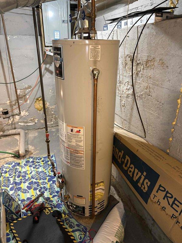 Responded to water heater service call for pilot light that would not remain lit. Upon arrival, inspected gas water heater located in basement utility area. Evaluated pilot assembly, thermocouple, and gas control valve for proper operation. Diagnosed faulty thermocouple preventing pilot flame from staying lit. Replaced thermocouple with new component and tested pilot ignition system. Verified proper pilot flame characteristics and main burner operation. Confirmed water heater restored to normal function with pilot remaining lit and unit heating properly.