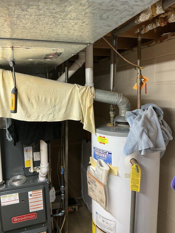 Completed annual cooling maintenance on a 5-year-old Goodman air conditioning system. Performed comprehensive tune-up including inspection of all mechanical components, electrical connections, and refrigerant lines. Verified proper operation of condensate pump and drainage system located in basement utility area. Inspected furnace and HVAC ductwork connections for seasonal readiness. All systems tested and found operating within manufacturer specifications.