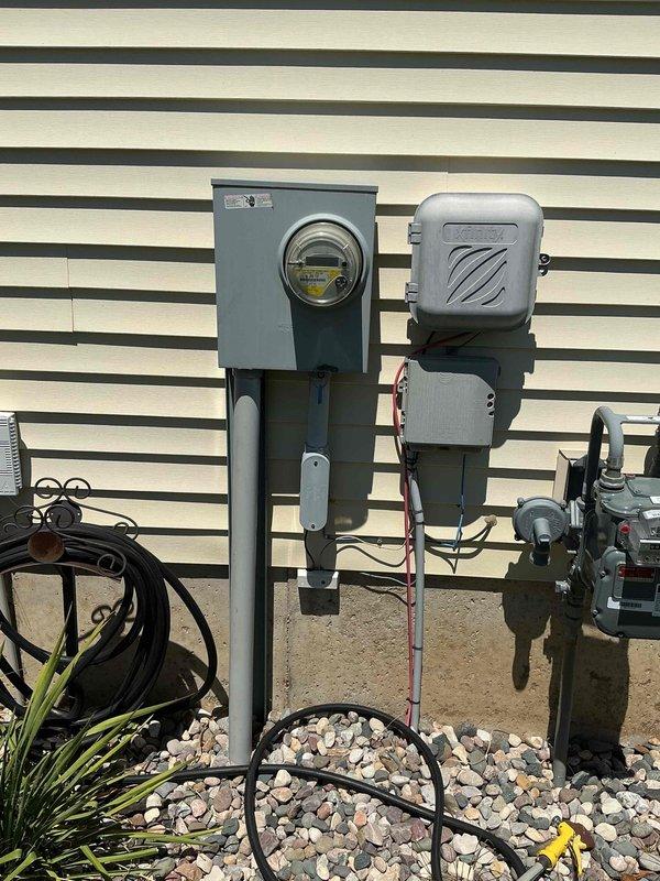 Completed comprehensive electrical club inspection of residential service installation. Evaluated exterior meter base, disconnect switch, and associated conduit connections mounted on building exterior, confirming proper installation and secure mounting of all components. Inspected main electrical panel interior, verified circuit breaker arrangement and labeling, and documented approved installation status with photographic evidence for compliance records.