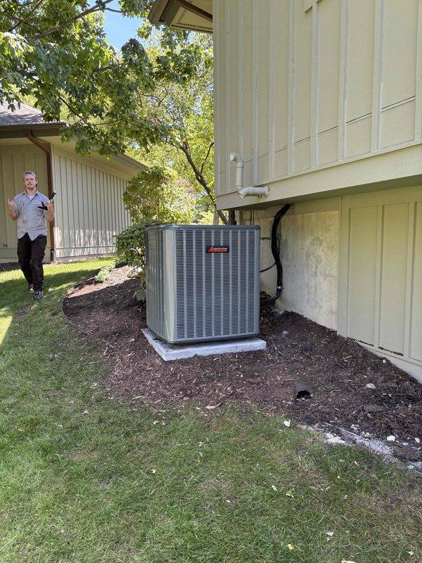 Completed full HVAC system replacement including outdoor condensing unit and indoor air handler. Installed new Carrier condensing unit on existing concrete pad with proper refrigerant line connections and electrical conduit routing along exterior wall. Replaced indoor furnace and air handler assembly in basement mechanical room with new Carrier equipment. Installed PVC condensate drainage piping and connected all ductwork to new system. Verified proper refrigerant charge, tested all electrical connections, and confirmed system operation. Unit operating within manufacturer specifications upon completion.
