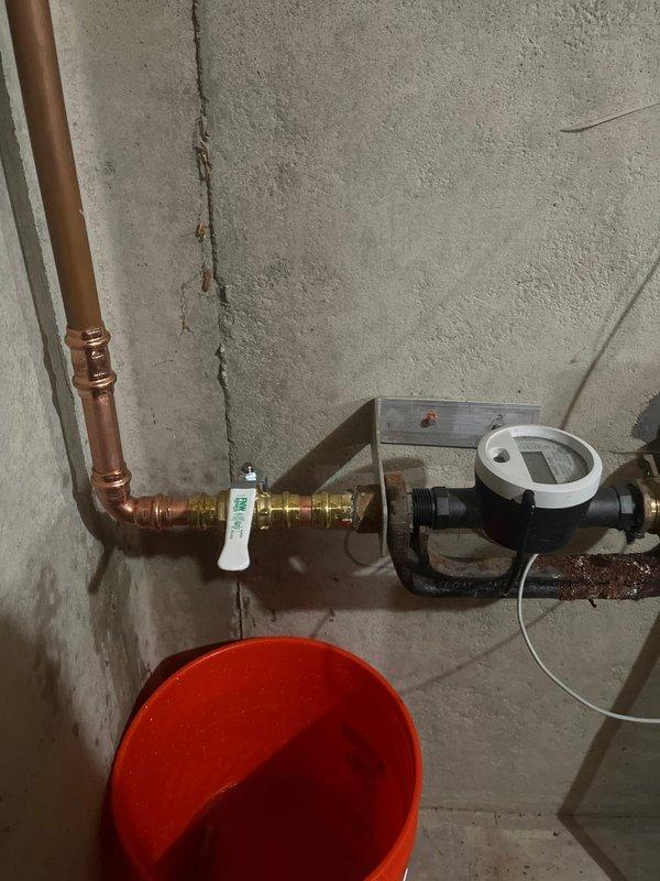 Completed copper waterline repairs by rebuilding the water supply line from the main shutoff valve. Installed new copper piping with proper fittings and elbows, integrated a new shutoff valve and flow meter for system monitoring and control. All connections were properly secured and tested to ensure leak-free operation.