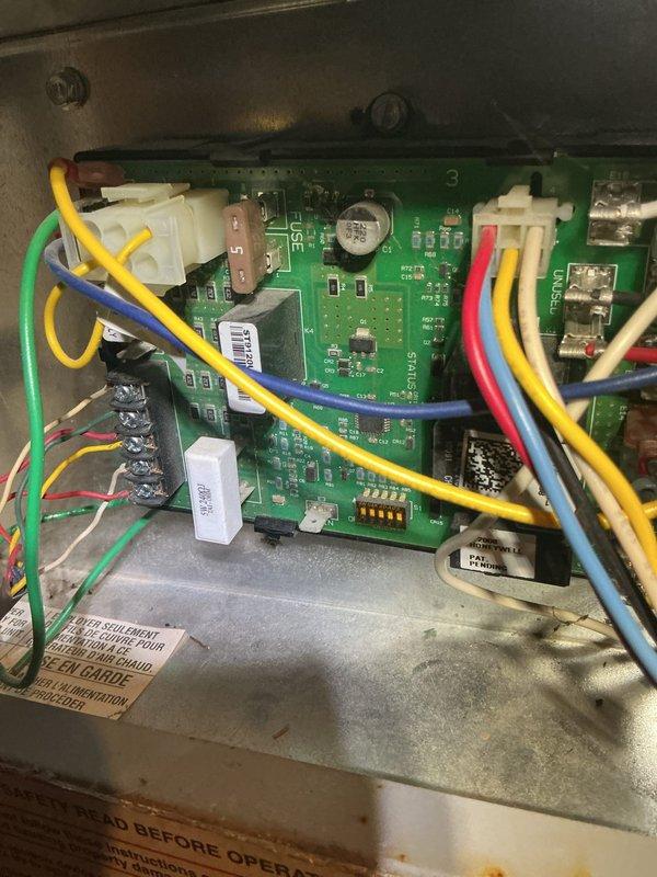 Completed annual cooling system maintenance on 30-year-old air conditioning unit. Performed comprehensive inspection of control board, electrical connections, and wiring harness within the air handler enclosure. Verified proper operation of all electronic components, terminal connections, and circuit board functionality. Inspected ductwork, mechanical systems, and overall HVAC equipment condition in basement utility area.