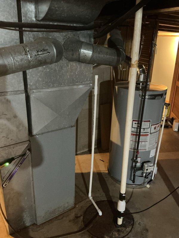 Completed annual cooling system maintenance on 30-year-old air conditioning unit. Performed comprehensive inspection of control board, electrical connections, and wiring harness within the air handler enclosure. Verified proper operation of all electronic components, terminal connections, and circuit board functionality. Inspected ductwork, mechanical systems, and overall HVAC equipment condition in basement utility area.