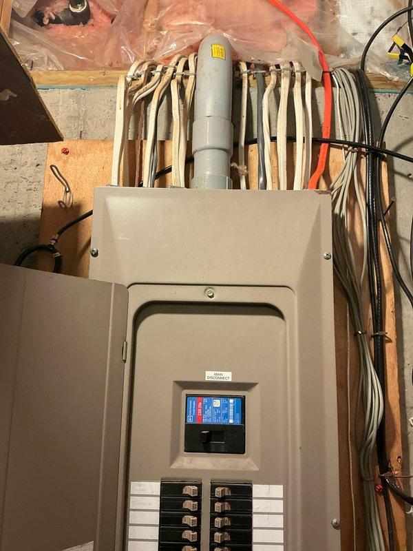 Completed on-site estimate for air conditioning system installation at residential property. Assessed existing electrical panel infrastructure in basement utility area, noting digital display panel with adequate breaker capacity and organized wiring configuration. Evaluated attic space conditions including accessible framing, existing insulation, ductwork routing, and clearances for new HVAC equipment placement. Documented all findings with photographic evidence and prepared comprehensive quote for complete AC system installation to meet urgent timeline requirements.