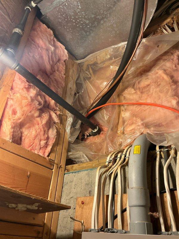 Completed on-site estimate for air conditioning system installation at residential property. Assessed existing electrical panel infrastructure in basement utility area, noting digital display panel with adequate breaker capacity and organized wiring configuration. Evaluated attic space conditions including accessible framing, existing insulation, ductwork routing, and clearances for new HVAC equipment placement. Documented all findings with photographic evidence and prepared comprehensive quote for complete AC system installation to meet urgent timeline requirements.