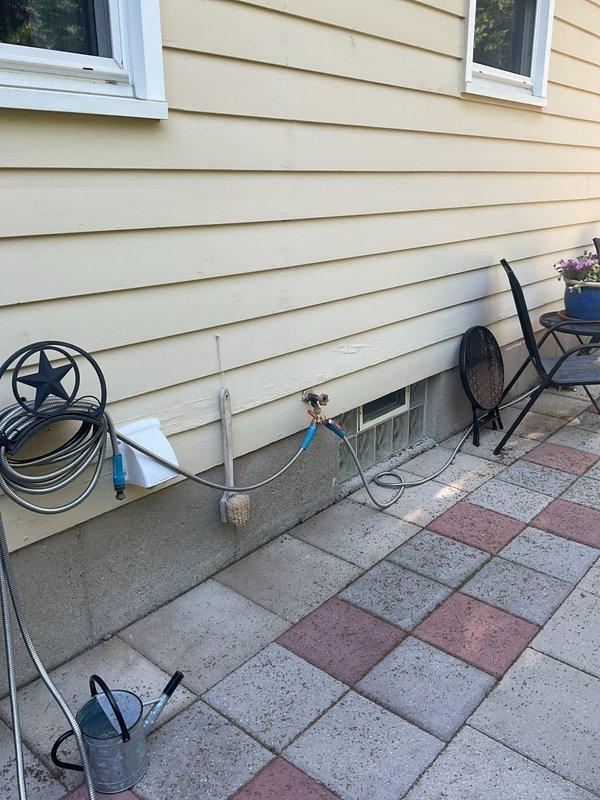 Responded to emergency call for exterior faucet leak causing basement flooding. Upon inspection, identified failed connection at outdoor hose bib allowing water to penetrate through foundation wall into basement living space. Shut off water supply, removed defective outdoor faucet assembly, and installed new frost-proof sillcock with proper sealing at wall penetration. Verified all connections were watertight and confirmed no further water intrusion into basement area when system was restored to service.
