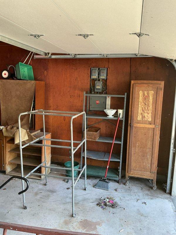 Conducted on-site assessment for AC system replacement estimate at residence with existing boiler heating system, estimated to be original to 1960s construction. Inspected current mechanical room configuration including hot water boiler, ductwork, water heater, and utility space layout to determine feasibility and requirements for new air conditioning installation. Documented existing equipment conditions and spatial considerations for future HVAC system integration.